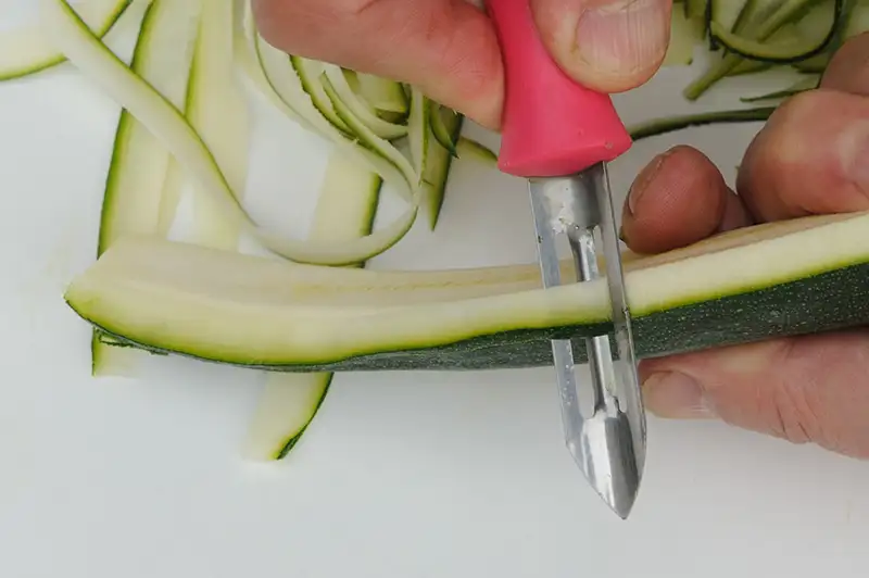 With a simple vegetable peeler