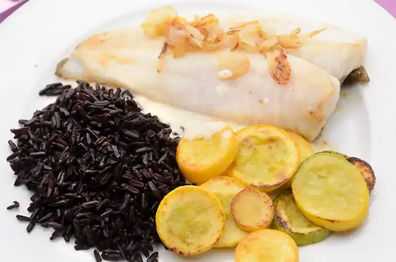 Fish, black rice and Zephyr zucchini